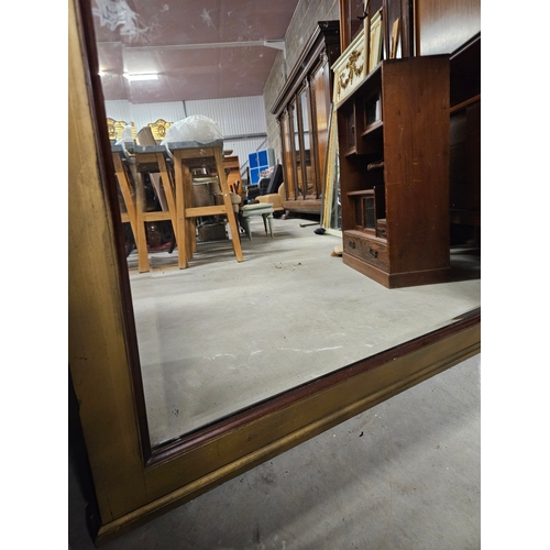 49 - Very large antique beveled edge mirror