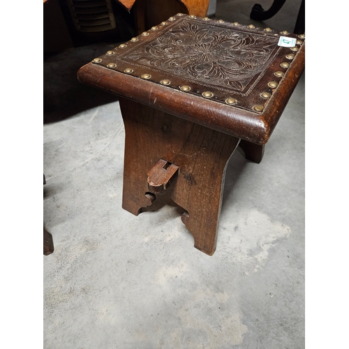 47 - Pair of antique leather topped stools