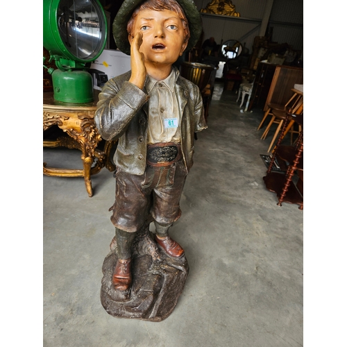 61 - Austrian/ German yodeling boy. In need of restoration (arm missing)