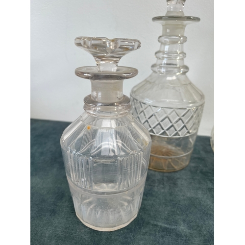 319 - 4 x Cut glass decanters