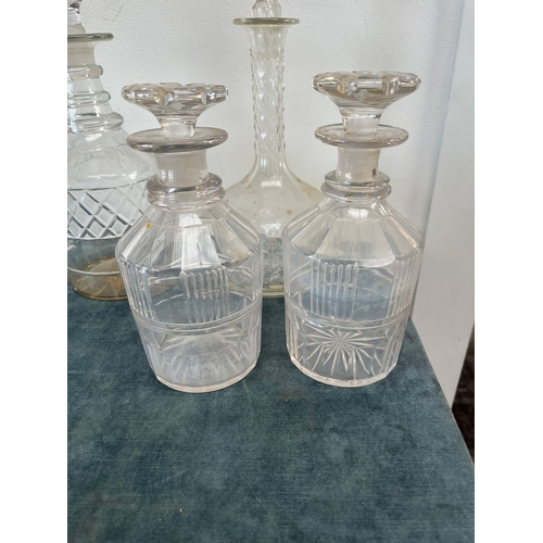 319 - 4 x Cut glass decanters