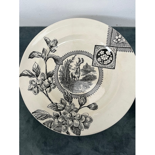 323 - 8 x antique plates decorated with stags