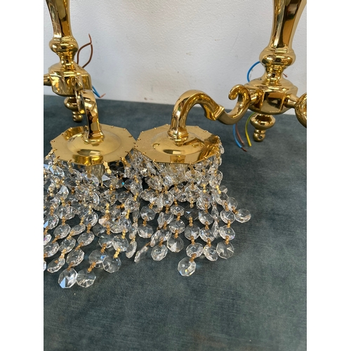 155 - Pair of crystal and brass wall hanging lights