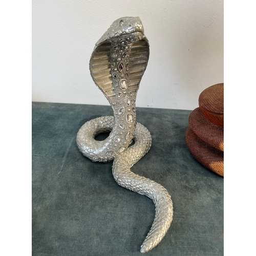 160 - Pair of snakes - One silver and one carved wood