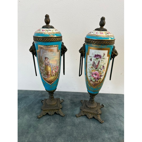 162 - Pair of French decorated urns with lion brass handles