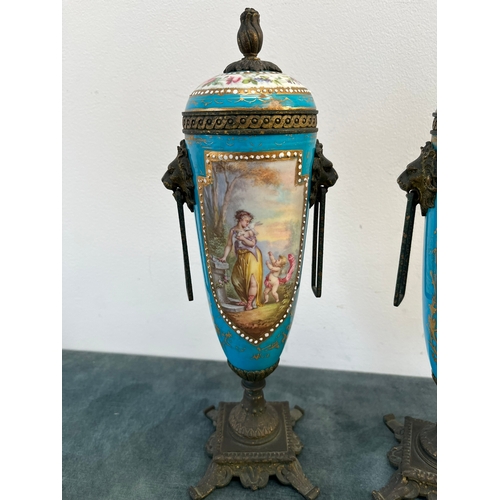 162 - Pair of French decorated urns with lion brass handles