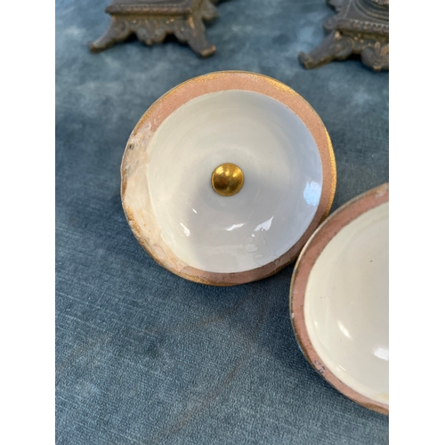 162 - Pair of French decorated urns with lion brass handles