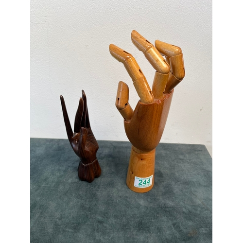 244 - Vintage hand mannequin and one other wooden hand