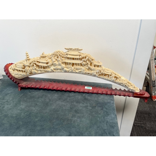 259 - Large resin elephant tusk style carving