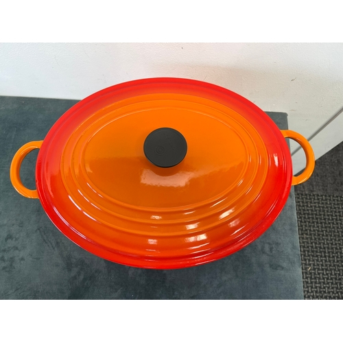 263 - Large Le Creuset cast iron oval casserole dish Volcanic orange - 35cm