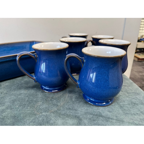 269 - Denby blue baking dish and six Denby mugs