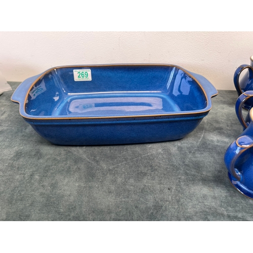 269 - Denby blue baking dish and six Denby mugs