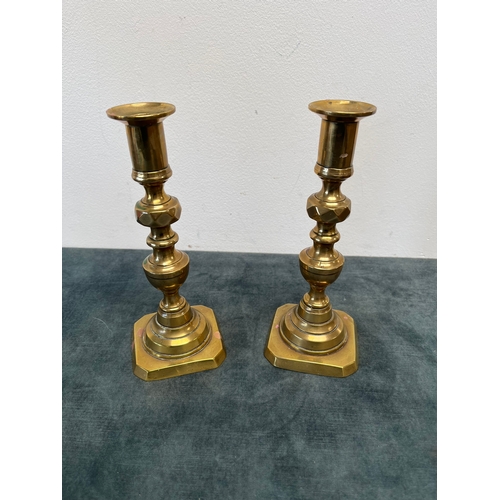 271 - Pair of antique brass candlesticks