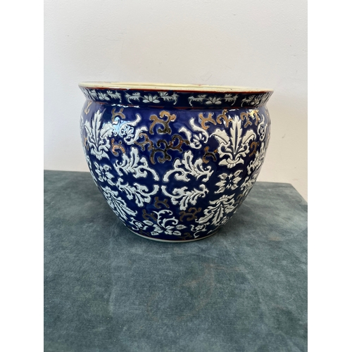 299 - Oriental decorated plant pot