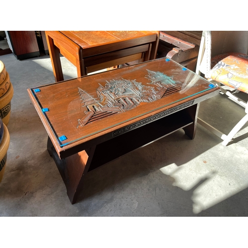 17 - Oriental coffee table carved with glass top