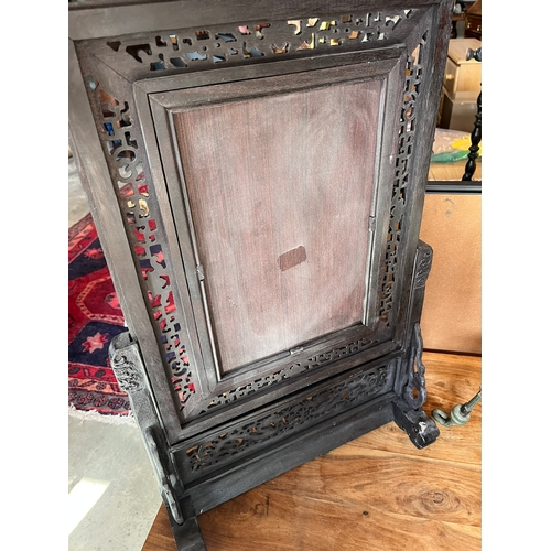 19 - Oriental carved hardwood screen with porcelain panel