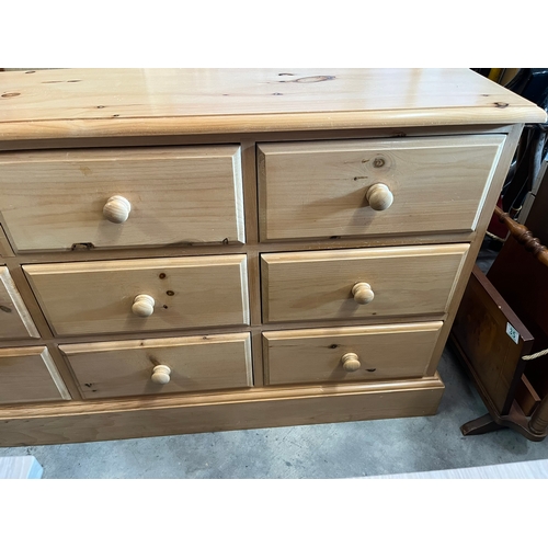 33 - Pine chest of 9 drawers