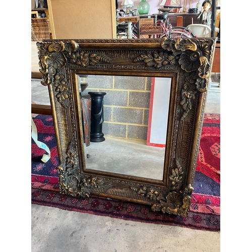 43 - Large modern gold gilt highly decorated mirror