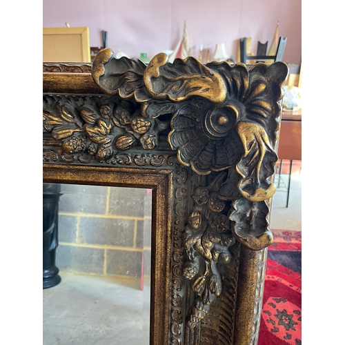 43 - Large modern gold gilt highly decorated mirror