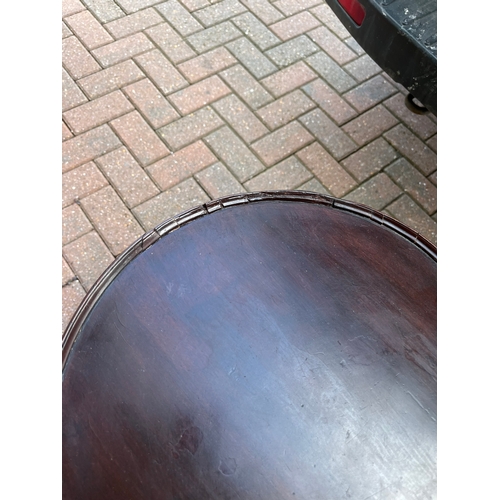 48 - Small round mahogany table