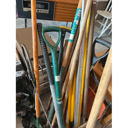 68 - Large assortment of garden tools (not including stand)