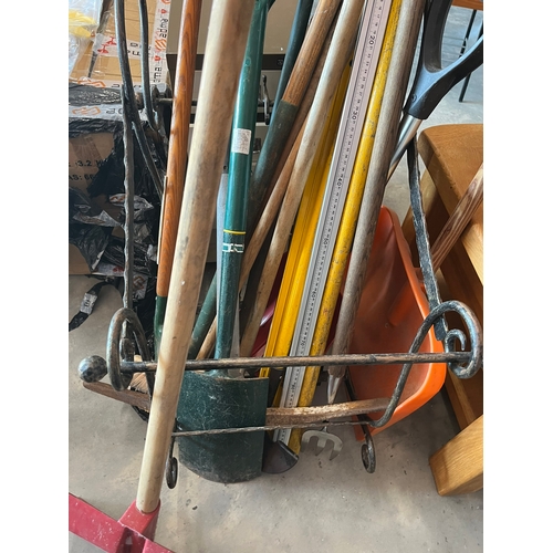 68 - Large assortment of garden tools (not including stand)