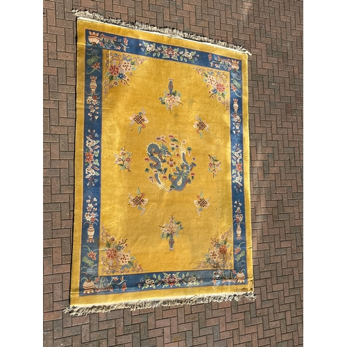 78 - Large yellow and blue oriental Chinese wool rug 

250cm x 350cm