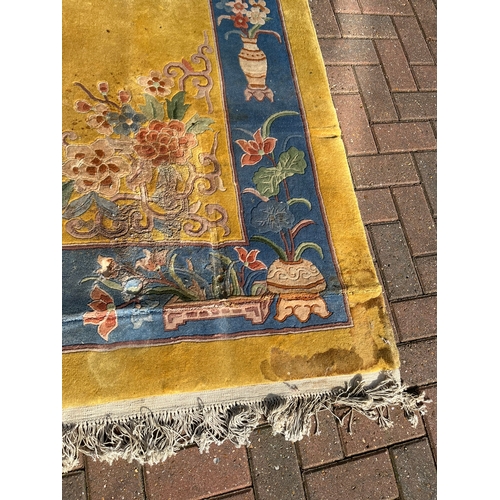 78 - Large yellow and blue oriental Chinese wool rug 

250cm x 350cm