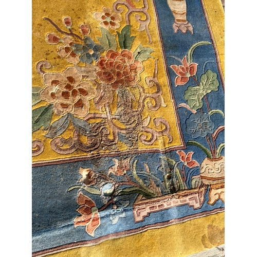 78 - Large yellow and blue oriental Chinese wool rug 

250cm x 350cm