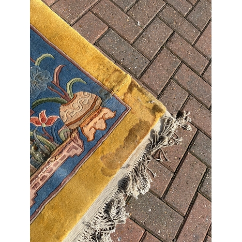 78 - Large yellow and blue oriental Chinese wool rug 

250cm x 350cm