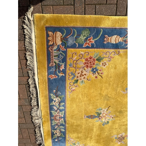 78 - Large yellow and blue oriental Chinese wool rug 

250cm x 350cm