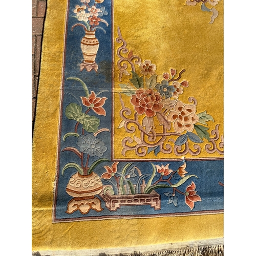 78 - Large yellow and blue oriental Chinese wool rug 

250cm x 350cm