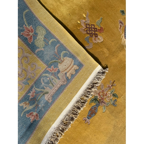 78 - Large yellow and blue oriental Chinese wool rug 

250cm x 350cm