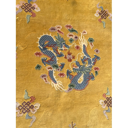 78 - Large yellow and blue oriental Chinese wool rug 

250cm x 350cm