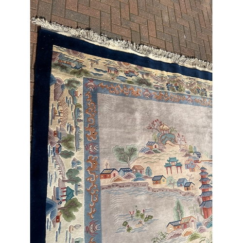 80 - Large oriental Chinese wool rug 

280cm x 370cm