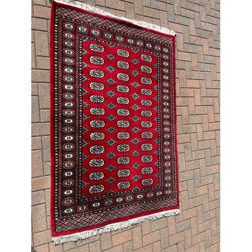 81 - Red Afghan Bokhara rug 

125cm x 180cm