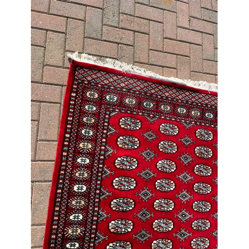 81 - Red Afghan Bokhara rug 

125cm x 180cm