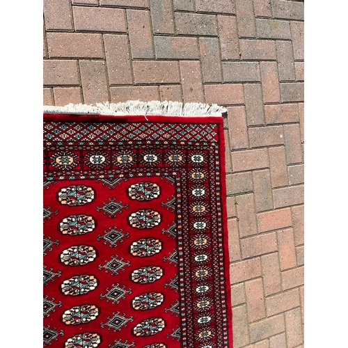 81 - Red Afghan Bokhara rug 

125cm x 180cm