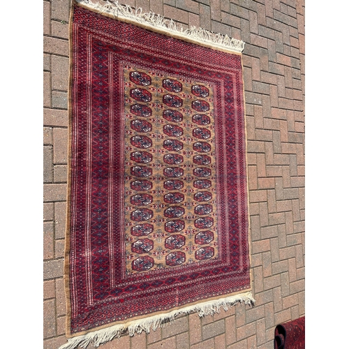 82 - Persian Bokhara rug 

130cm x 190cm