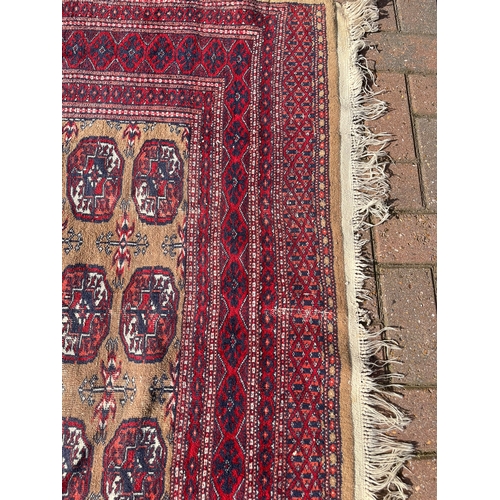 82 - Persian Bokhara rug 

130cm x 190cm