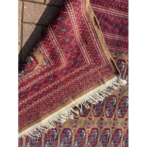 82 - Persian Bokhara rug 

130cm x 190cm