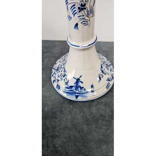 216 - Large pair of Dutch Delft blue and white porcelain candlesticks