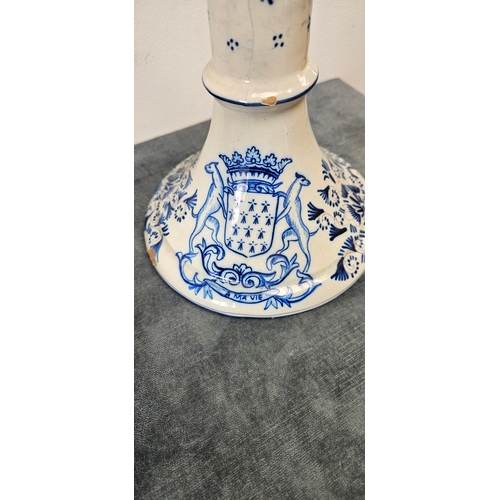 216 - Large pair of Dutch Delft blue and white porcelain candlesticks