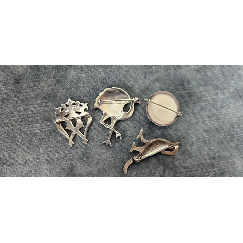 562 - 4 x Silver brooches including delft and birds