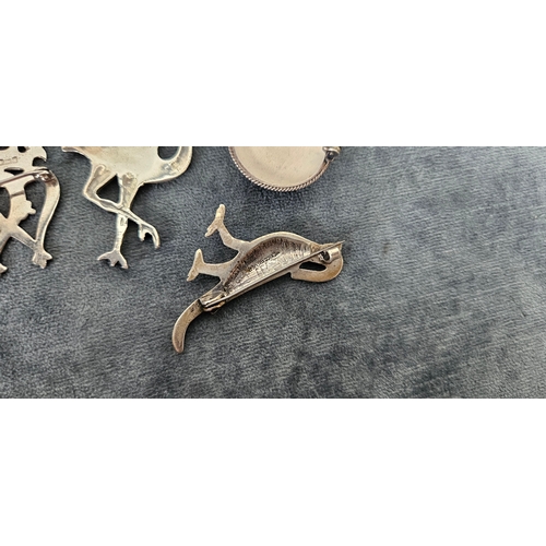 562 - 4 x Silver brooches including delft and birds
