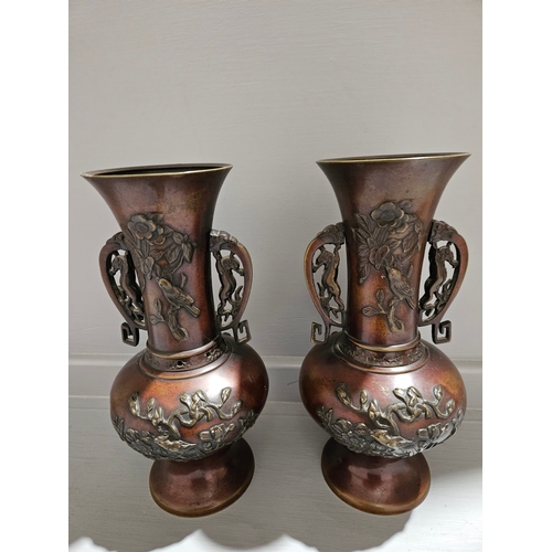 262 - A Pair Of Meiji Period Double Handle Bronze Vases