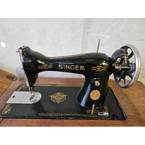 777 - 2 Oak Treadle Singer Sewing Machines