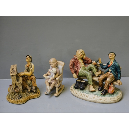 217 - 4 Assorted Figurines