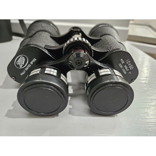 452 - Pair Of 'Boots' Binoculars  10 x 50 In Leather Case & 2 Brass Candleholders