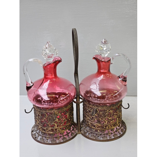 96 - A Pair Of Cranberry Glass Oil/Vinegar Decanters In Plated Stand, A Pair Of Green Glass Dishes In Pla... 